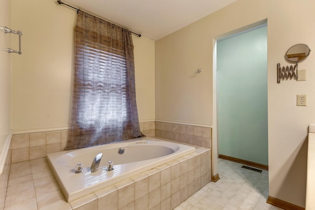 212 Jake Ln, Hampshire, IL 60140 - full bathroom featuring a bath and baseboards