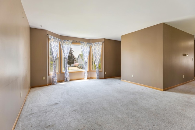 212 Jake Ln, Hampshire, IL 60140 - empty room with light carpet and baseboards