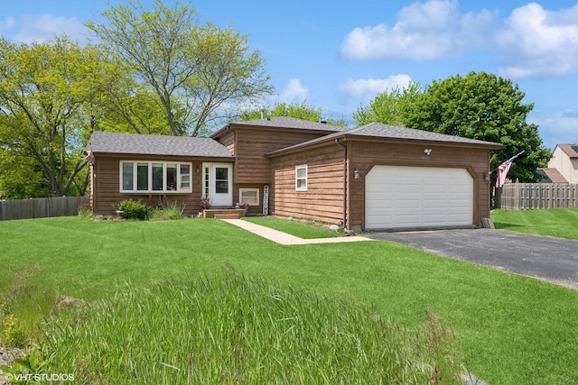 4832 Crest Ct, Waukegan, IL 60087 - tri-level home featuring a garage and driveway