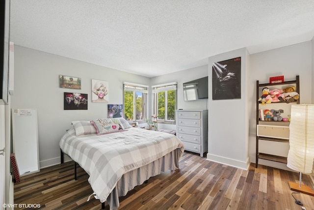 4832 Crest Ct, Waukegan, IL 60087 - bedroom with wood finished floors and a textured ceiling