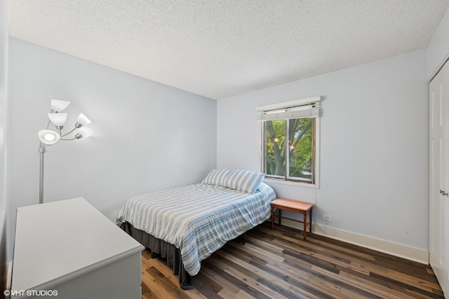 4832 Crest Ct, Waukegan, IL 60087 - bedroom featuring dark wood finished floors and a textured ceiling