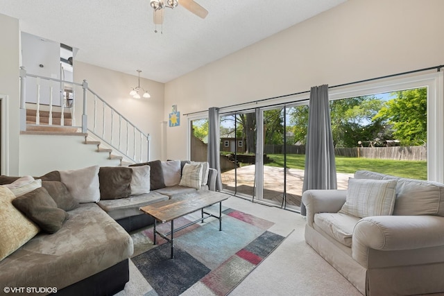 4832 Crest Ct, Waukegan, IL 60087 - living area featuring carpet flooring, stairway, ceiling fan, and a chandelier