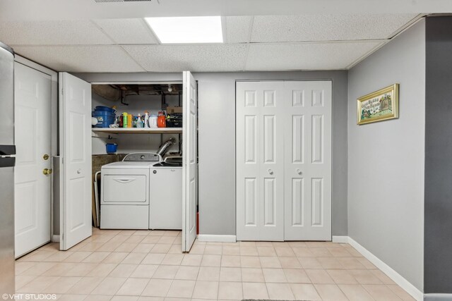7626 Deerfield Ave, Woodridge, IL 60517 - laundry room featuring separate washer and dryer and light tile patterned floors