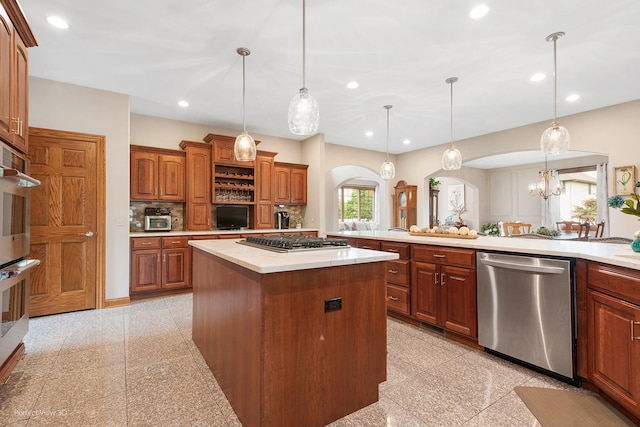 2024 Taller Rd, Morris, IL 60450 - kitchen featuring appliances with stainless steel finishes, arched walkways, granite tiled floors, light countertops, and recessed lighting