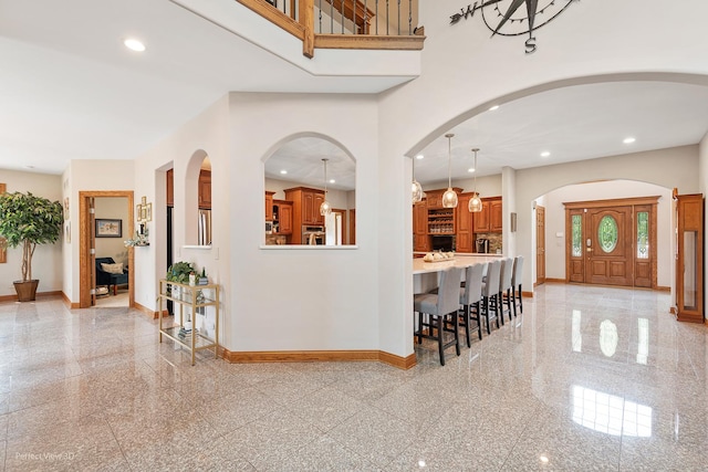 2024 Taller Rd, Morris, IL 60450 - foyer with granite tiled floors, recessed lighting, and arched walkways