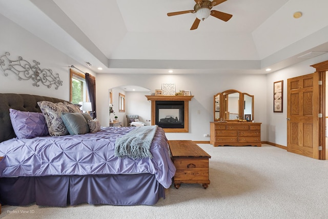 2024 Taller Rd, Morris, IL 60450 - carpeted bedroom with arched walkways, recessed lighting, lofted ceiling, a ceiling fan, and a raised ceiling