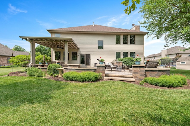 2024 Taller Rd, Morris, IL 60450 - rear view of property with a ceiling fan, a chimney, a patio, and a yard