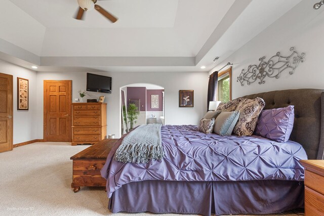 2024 Taller Rd, Morris, IL 60450 - carpeted bedroom with arched walkways, recessed lighting, a raised ceiling, and ceiling fan