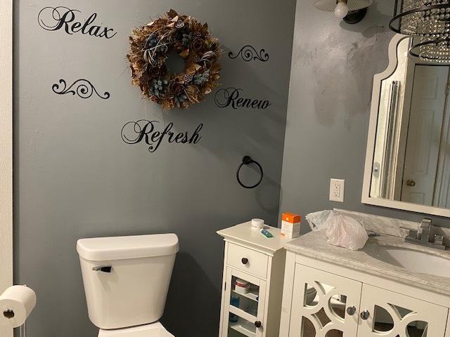 23 Acapulco Dr, Putnam, IL 61560 - half bath with vanity and toilet