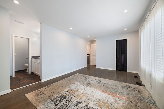 7013 W Greenleaf St, Niles, IL 60714 - spare room with dark wood-style floors and recessed lighting