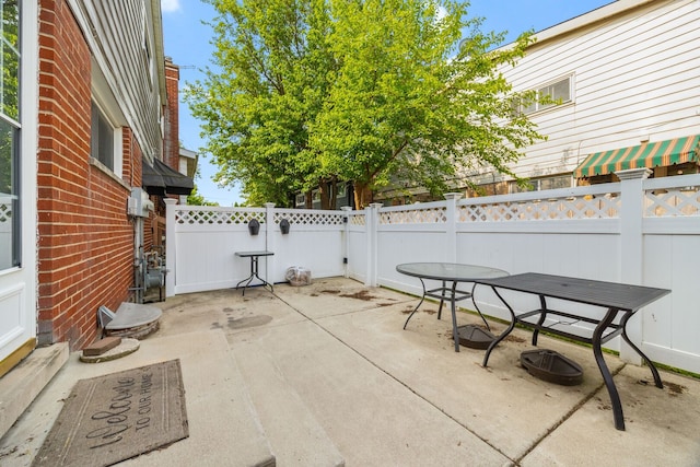 7013 W Greenleaf St, Niles, IL 60714 - view of patio featuring outdoor dining space