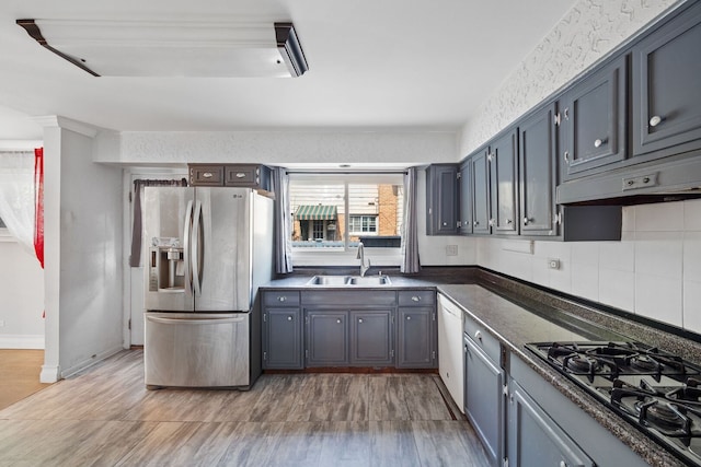 7013 W Greenleaf St, Niles, IL 60714 - kitchen featuring stainless steel fridge with ice dispenser, gas cooktop, dishwasher, dark countertops, and decorative backsplash