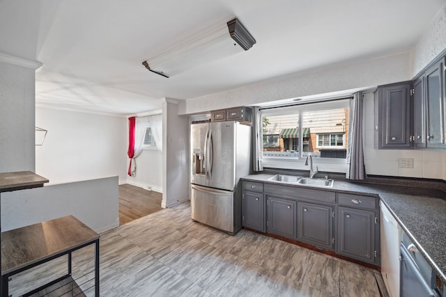 7013 W Greenleaf St, Niles, IL 60714 - kitchen featuring stainless steel fridge with ice dispenser, dark countertops, dishwasher, gray cabinets, and ornamental molding
