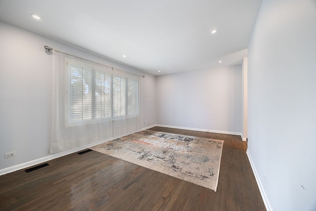 7013 W Greenleaf St, Niles, IL 60714 - spare room featuring wood finished floors and recessed lighting