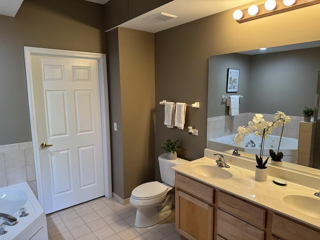 1479 N Milwaukee Ave Unit 312, Libertyville, IL 60048 - bathroom with tile patterned floors, a bath, and double vanity