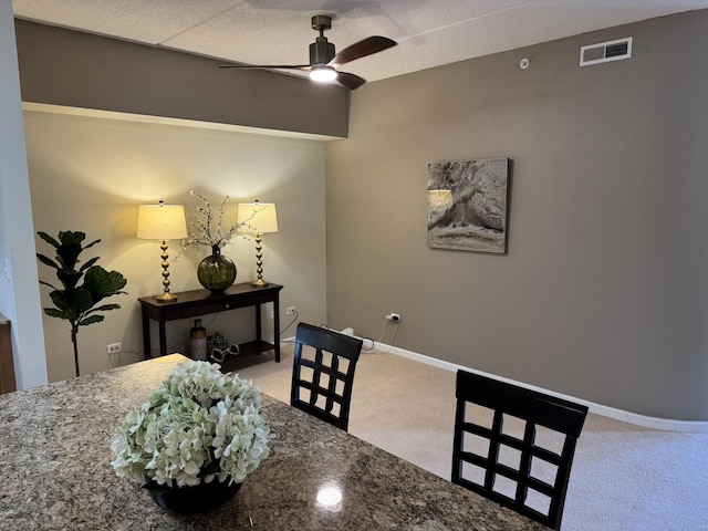 1479 N Milwaukee Ave Unit 312, Libertyville, IL 60048 - dining room featuring a ceiling fan and carpet