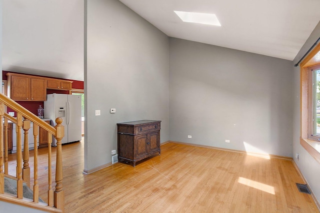 3 Clark Ave, Lake In The Hills, IL 60156 - stairway with wood finished floors, a skylight, and lofted ceiling