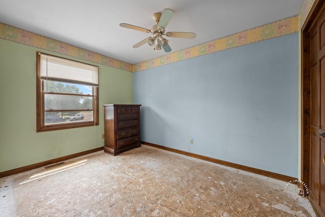 1340 Ironwood Ct, Aurora, IL 60506 - spare room with baseboards and a ceiling fan