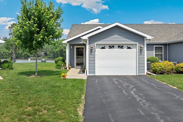 1523 Eadens Pl Unit 1523, Dixon, IL 61021 - ranch-style home with an attached garage, a front yard, asphalt driveway, and roof with shingles