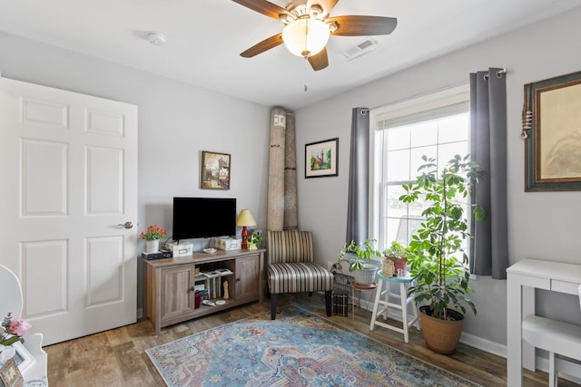 1523 Eadens Pl Unit 1523, Dixon, IL 61021 - sitting room with a ceiling fan and wood finished floors