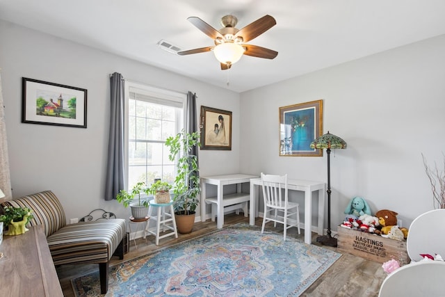 1523 Eadens Pl Unit 1523, Dixon, IL 61021 - living area featuring a ceiling fan and wood finished floors