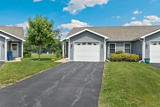 1523 Eadens Pl Unit 1523, Dixon, IL 61021 - ranch-style home with a garage, asphalt driveway, a front lawn, and a shingled roof