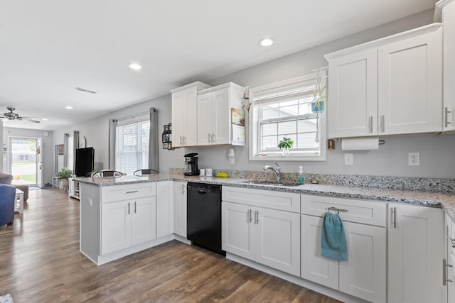 1523 Eadens Pl Unit 1523, Dixon, IL 61021 - kitchen with dishwasher, a peninsula, white cabinets, recessed lighting, and dark wood-style floors