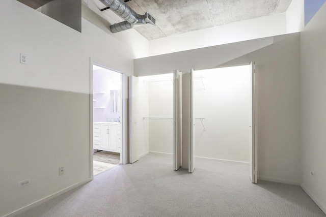 1000 W Adams St Unit 523, Chicago, IL 60607 - unfurnished bedroom featuring light colored carpet and connected bathroom
