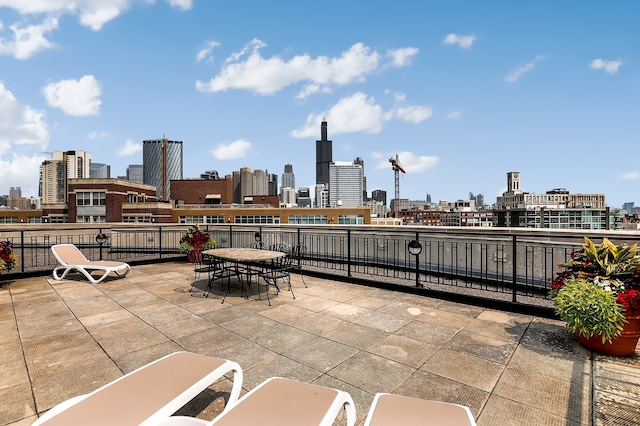 1000 W Adams St Unit 523, Chicago, IL 60607 - view of patio / terrace with a view of skyline and outdoor dining space