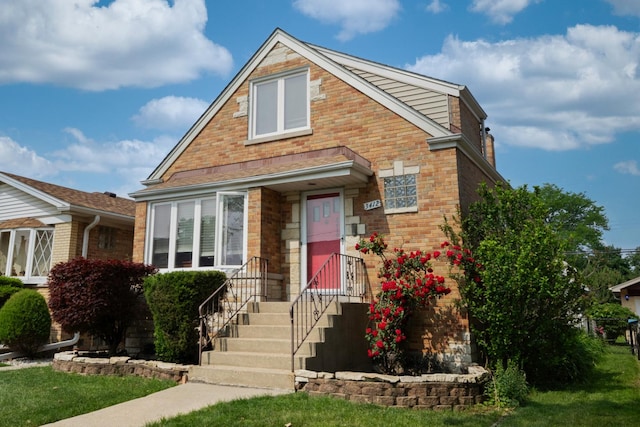 3412 N Oleander Ave, Chicago, IL 60634 - view of front facade featuring a front yard and brick siding