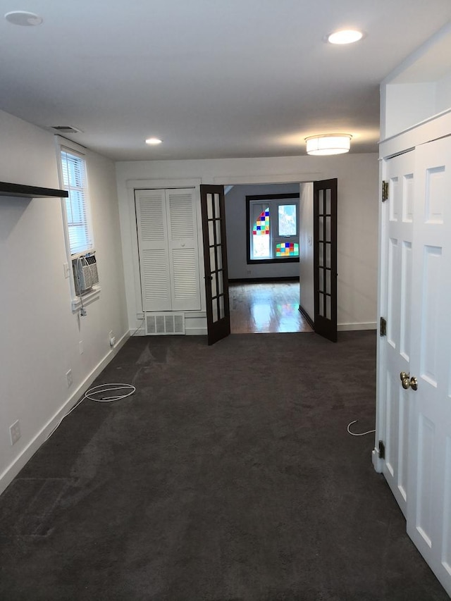 853 N Hoyne Ave, Chicago, IL 60622 - hallway with french doors, cooling unit, dark carpet, and recessed lighting