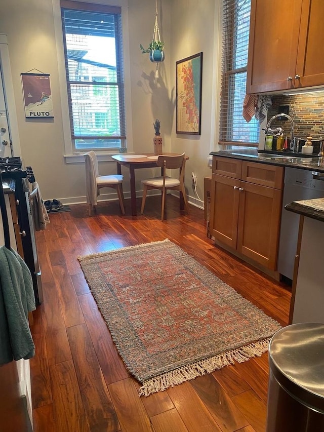 853 N Hoyne Ave, Chicago, IL 60622 - dining area with baseboards and dark wood finished floors