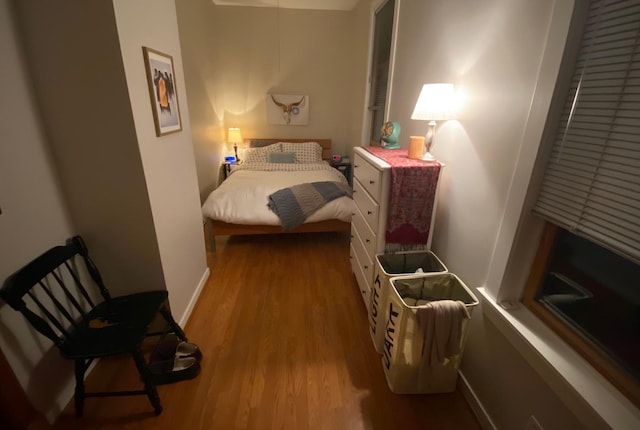 853 N Hoyne Ave, Chicago, IL 60622 - bedroom with wood finished floors and baseboards