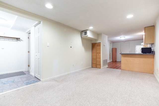 853 N Hoyne Ave, Chicago, IL 60622 - unfurnished living room featuring light colored carpet, recessed lighting, and crown molding