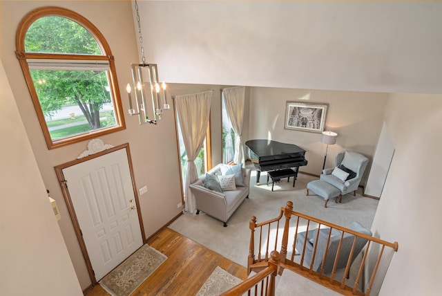 856 Fieldcrest Dr, Bolingbrook, IL 60490 - foyer entrance featuring wood finished floors and a chandelier