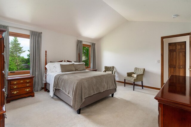 856 Fieldcrest Dr, Bolingbrook, IL 60490 - bedroom with vaulted ceiling, multiple windows, and light carpet