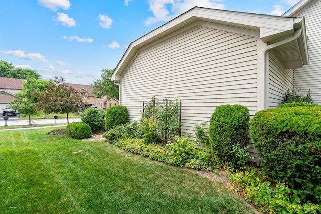 856 Fieldcrest Dr, Bolingbrook, IL 60490 - view of home's exterior with a lawn