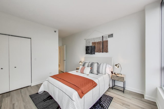 1841 S Calumet Ave Unit 1808, Chicago, IL 60616 - bedroom with light wood-type flooring and a closet