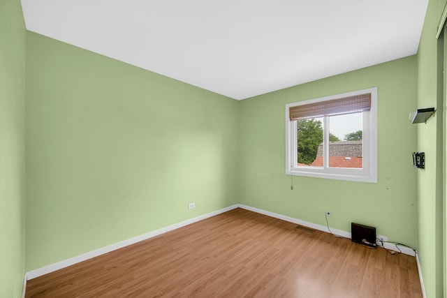 570 Sundance Ct, Carol Stream, IL 60188 - unfurnished room featuring baseboards and wood finished floors