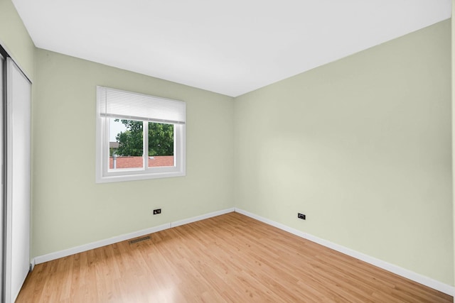 570 Sundance Ct, Carol Stream, IL 60188 - unfurnished bedroom with a closet and light wood-type flooring