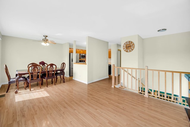 570 Sundance Ct, Carol Stream, IL 60188 - dining room featuring light wood-style flooring and a ceiling fan