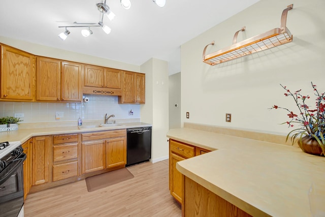 570 Sundance Ct, Carol Stream, IL 60188 - kitchen with black dishwasher, range with gas cooktop, light wood finished floors, backsplash, and light countertops