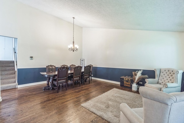 1316 Fireside Ct, Naperville, IL 60564 - dining space with a chandelier, stairs, wood finished floors, a textured ceiling, and lofted ceiling