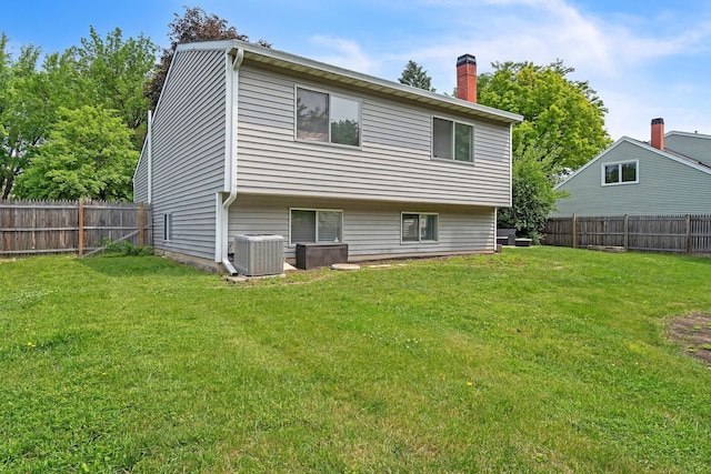 1316 Fireside Ct, Naperville, IL 60564 - rear view of house featuring a chimney and a fenced backyard