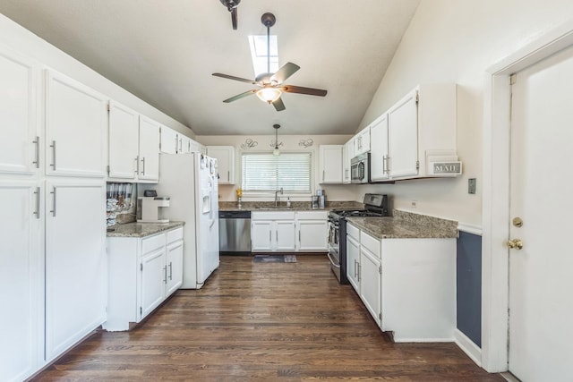 1316 Fireside Ct, Naperville, IL 60564 - kitchen featuring stainless steel appliances, a ceiling fan, lofted ceiling, white cabinetry, and dark wood finished floors