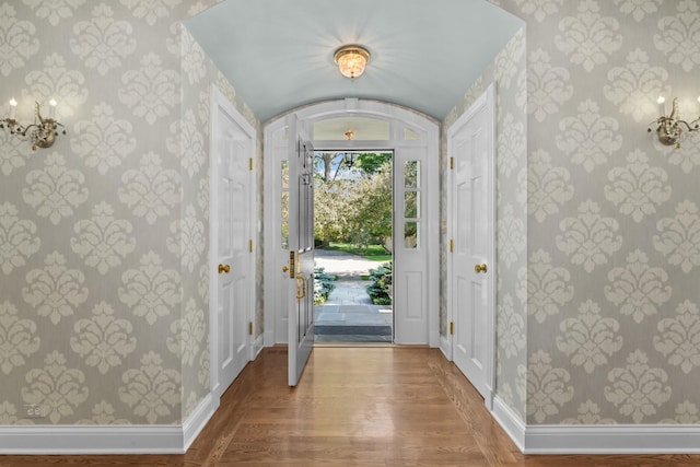 545 Sheridan Rd, Winnetka, IL 60093 - entryway with wallpapered walls and wood finished floors