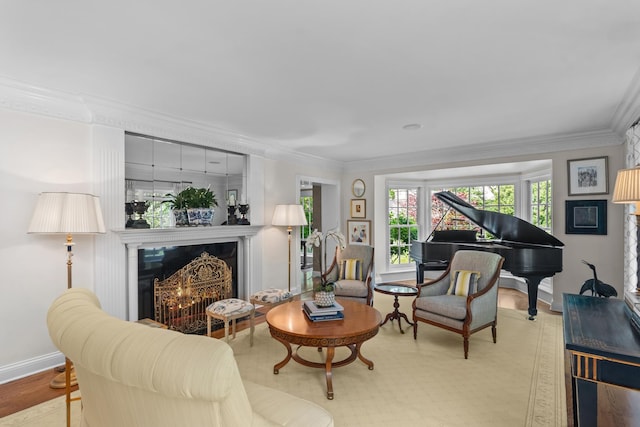 545 Sheridan Rd, Winnetka, IL 60093 - living area with ornamental molding, a warm lit fireplace, and wood finished floors