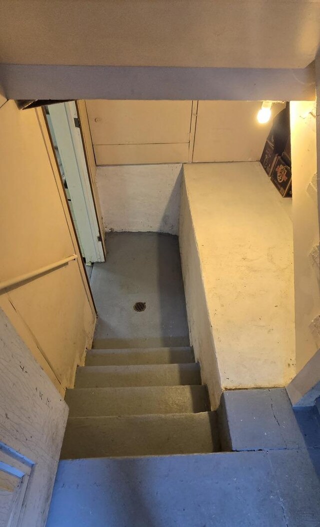 6119 W School St, Chicago, IL 60634 - stairway with concrete flooring