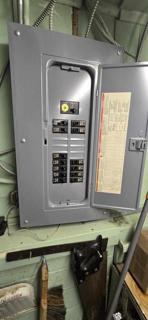 6119 W School St, Chicago, IL 60634 - utility room with electric panel