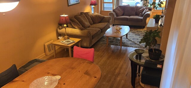 6119 W School St, Chicago, IL 60634 - living room featuring wood finished floors